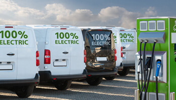 A row of electric cargo vans