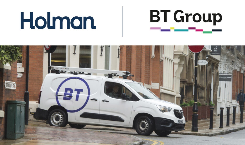 A white BT van driving on a road with the Holman and BT Group logos above